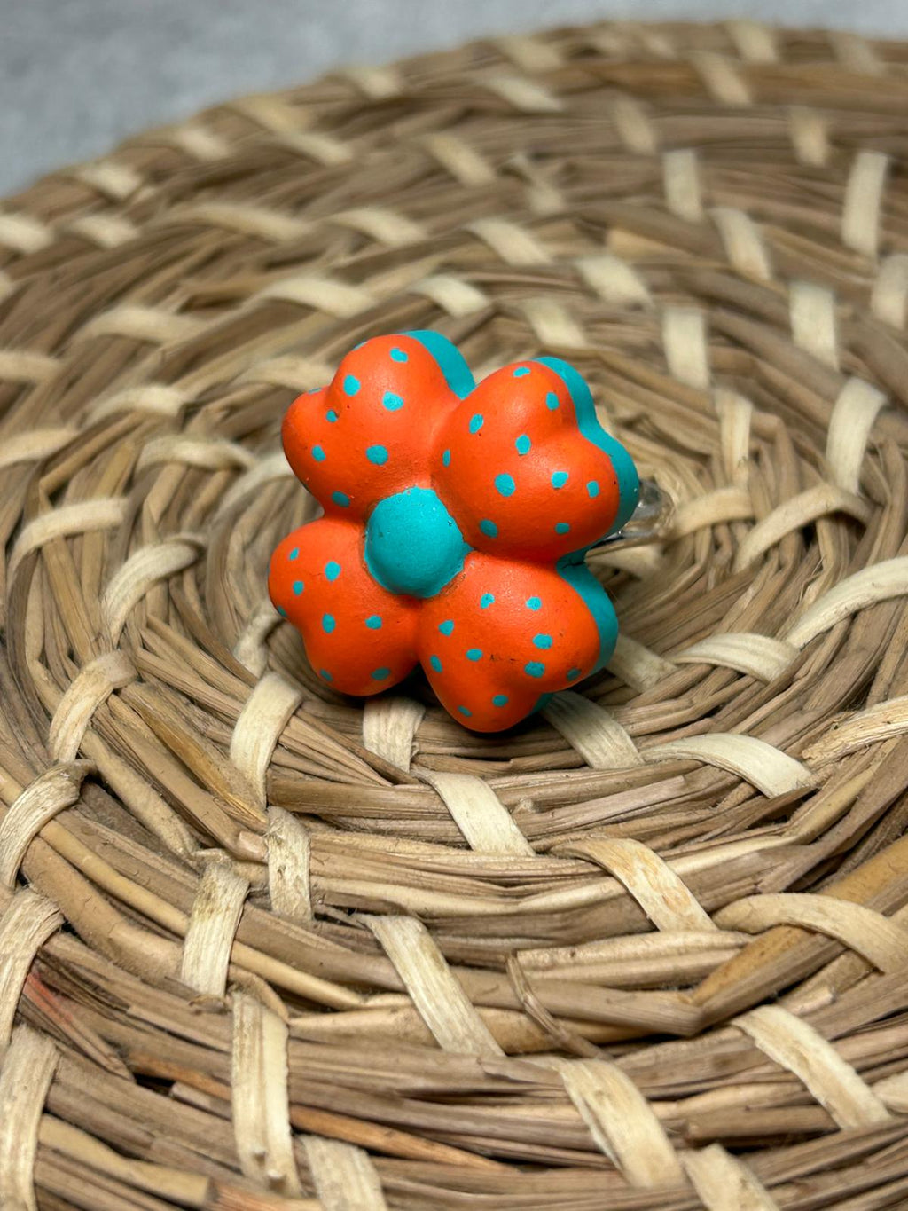 Anillo flor naranja y turquesa